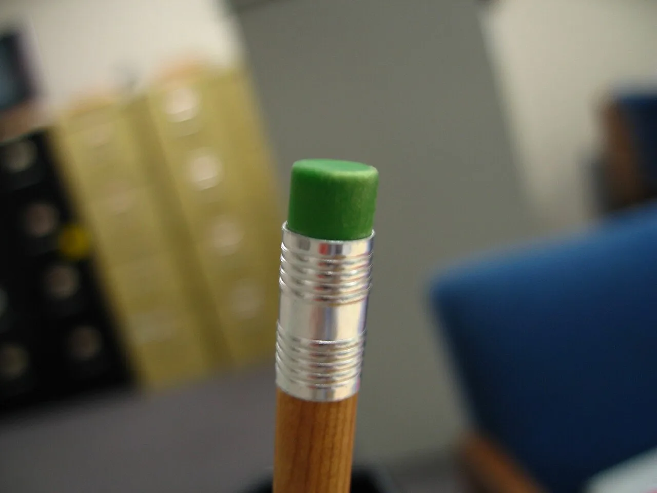 A close-up of the eraser end of a pencil